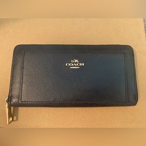 Coach Long Zip Around Wallet Black- brown interior trim. Good condition-see pics